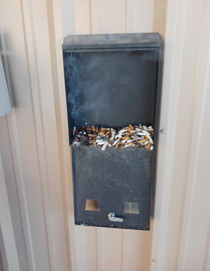 Full cigarette dump bins are indeed a hazard and can cause fires. Cigarettes left unattended or improperly disposed of can ignite and start fires, especially in dry conditions.